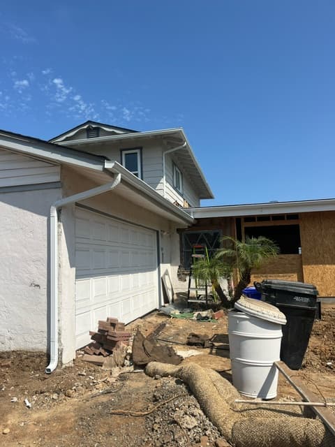 picture of a home with new gutters and downspouts